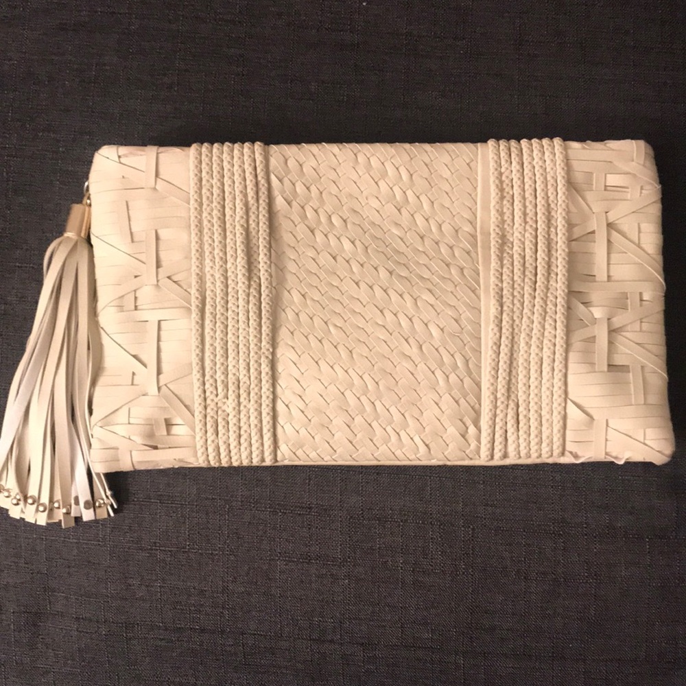 Cream colored clutch with tassel - NWOT